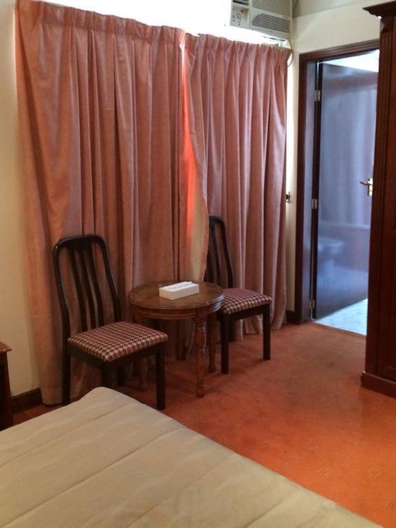 City Center Hotel Manama Zimmer foto