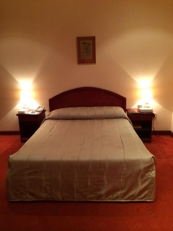 City Center Hotel Manama Zimmer foto